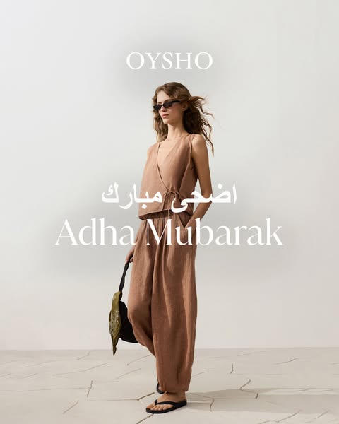 This image ad for Oysho features a model wearing a matching linen top and pants set, wishing viewers a happy Adha Mubara