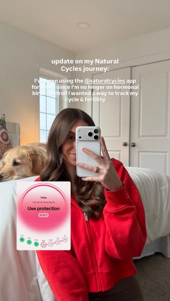 A woman films herself using the Natural Cycles app in what appears to be an unpaid testimonial ad.