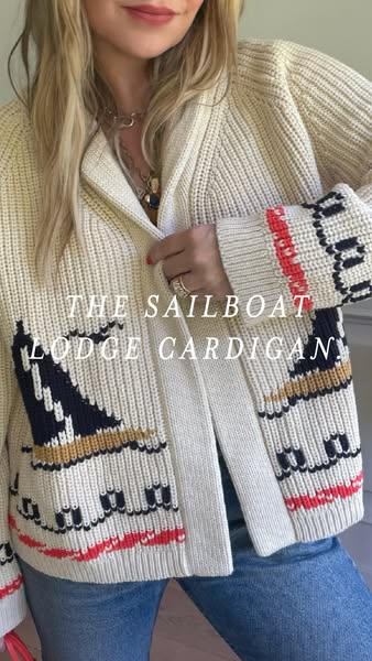 An ad showcasing a chunky, off-white knit cardigan with a sailboat design and details on the sleeves and bottom. The ad 