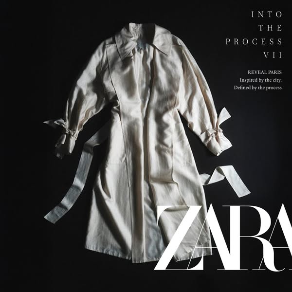 This ad for Zara features a light-colored trench coat laid flat on a black background. The ad copy references Paris and 