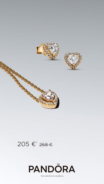 This ad features a gold-tone necklace and earring set from Pandora, highlighting the heart-shaped design with diamond ac