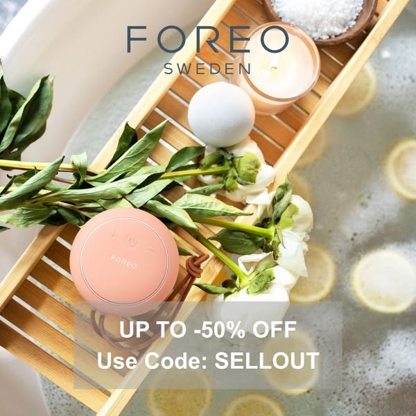 This ad showcases Foreo's LUNA play smart 2 facial cleansing device in a spa-like setting with lemon slices, bath sa