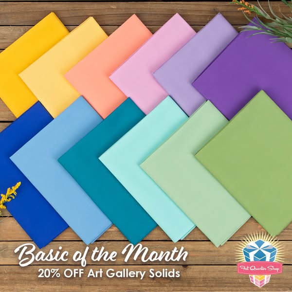 This image ad for Fat Quarter Shop promotes their 'Basic of the Month' sale, highlighting Art Gallery Solids fab
