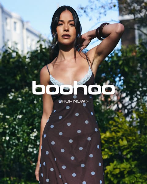 This image ad features a woman wearing a polka dot dress. The brand logo is displayed in the center of the image with a 