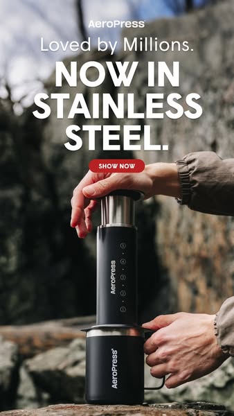 This image ad from AeroPress promotes their coffee press, highlighting that it is now available in stainless steel. The 