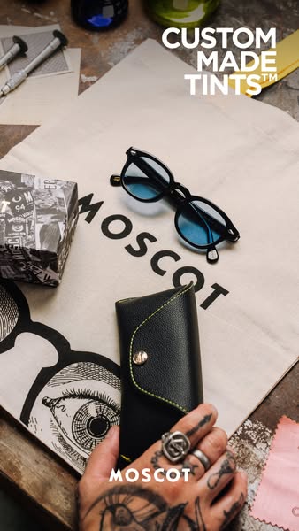 This ad showcases Moscot eyewear, specifically highlighting the availability of custom-made tints. It incorporates lifes