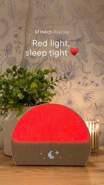 This ad highlights the Hatch Restore product, focusing on its red light feature to promote better sleep.