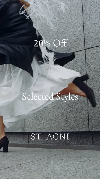 This image ad features a person wearing St. Agni brand clothing and shoes. The ad promotes a 20% off sale on selected st