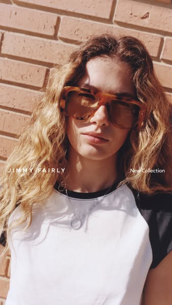 This image ad showcases Jimmy Fairly eyewear on a model in a lifestyle setting, highlighting the new collection.