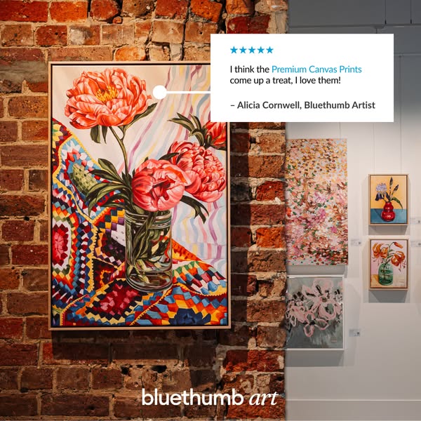 This ad for Bluethumb Art features a testimonial from an artist who loves the Premium Canvas Prints. The image shows a f