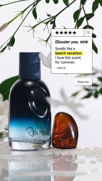 This ad for Glossier You perfume features a quote from a user, Cami G., who states that the perfume smells like a 'b