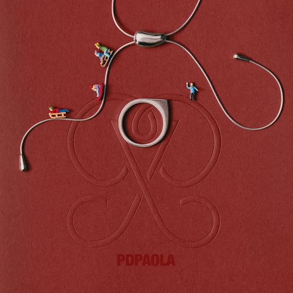 This ad features a silver ring and necklace from the brand PDPAOLA. The jewelry is arranged on a red background with min