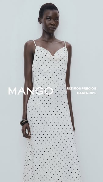 This image ad for Mango features a Black model wearing a cream-colored, polka dot print dress against a pale, neutral ba