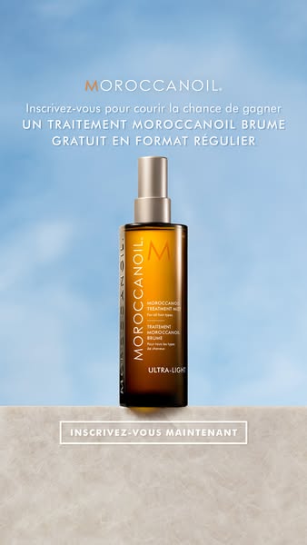 This ad promotes a giveaway for a free full-size Moroccanoil Brume treatment. The ad features a single product shot of t