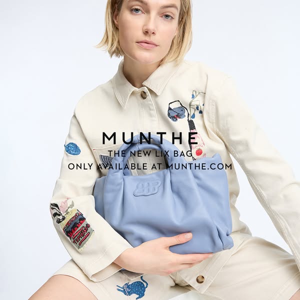 This ad features a woman holding a blue Munthe Lix bag. The ad highlights the bag and directs viewers to the brand's
