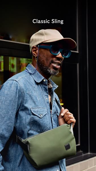 This image ad showcases a stylish individual wearing a khaki baseball cap, blue sunglasses, and a denim shirt, accessori