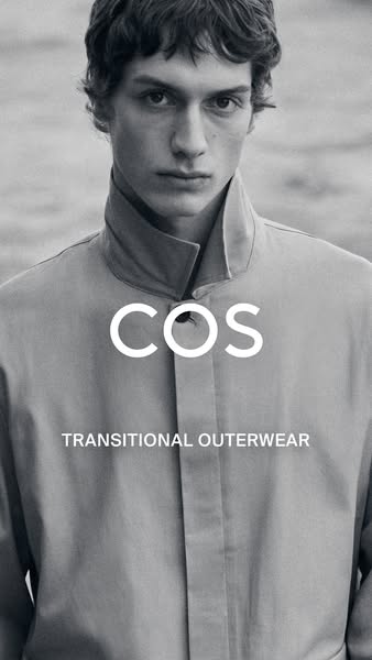 This ad showcases a gray COS jacket on a male model. The ad is in black and white and includes the brand logo and the wo