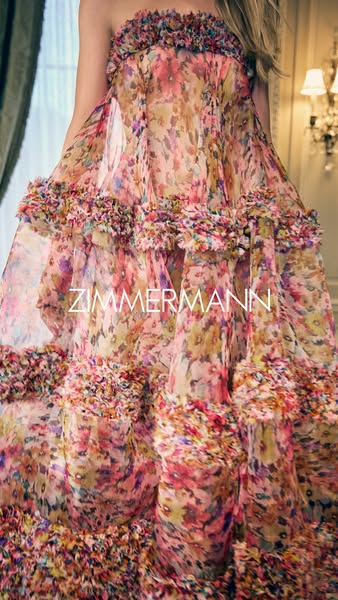 This ad features a Zimmermann gown, showcasing the beauty and elegance of the floral dress.