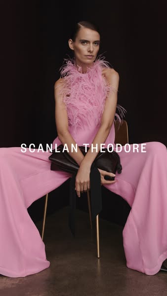 This image ad features a still shot of a model in a pink outfit, intended for a fashion-forward audience. The ad promote