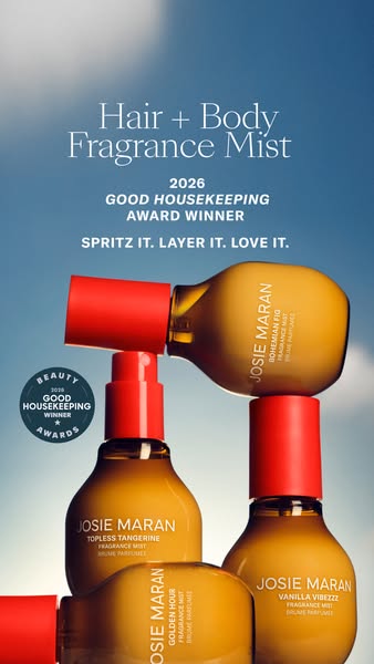 This ad showcases Josie Maran Hair + Body Fragrance Mist. It features three product bottles in various scents stacked ag