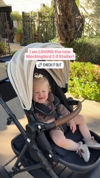 This image ad showcases the Mockingbird 3.0 stroller. It features a toddler seated in the stroller with a warm expressio