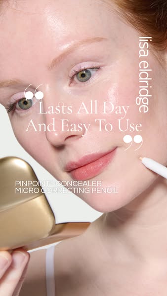 This ad showcases the Lisa Eldridge Pinpoint Concealer with a close-up of a woman applying the concealer. The ad emphasi