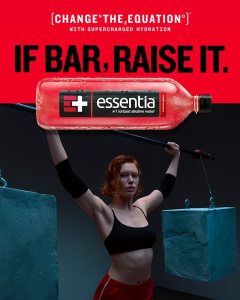 An image ad featuring a woman weightlifting with a bottle of Essentia water, promoting the brand's positioning aroun