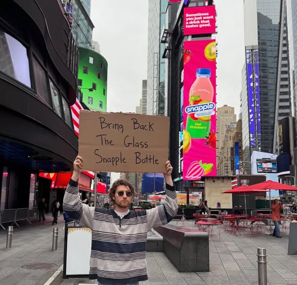 DudewithSign ad