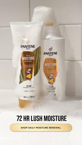 This image ad features two bottles of Pantene Daily Moisture Renewal shampoo and conditioner covered in bubbles to show 