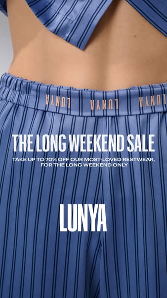 This image ad for Lunya promotes a Long Weekend Sale, offering up to 70% off on their most-loved restwear. The close-up 
