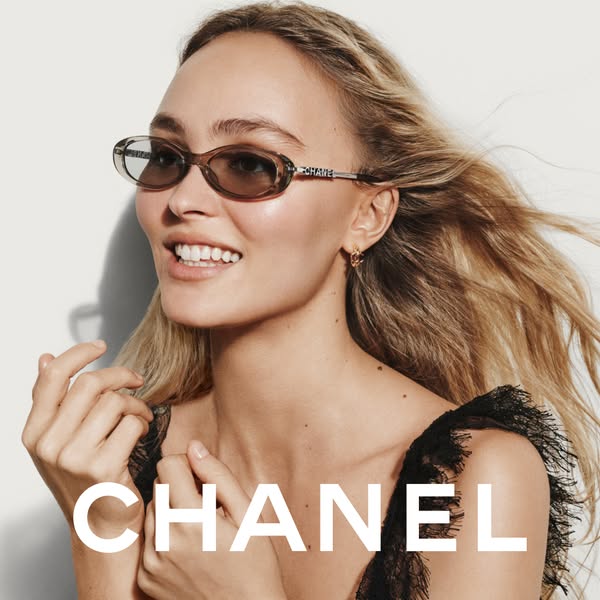 A campaign ad for Chanel sunglasses, featuring a blonde woman wearing the glasses.