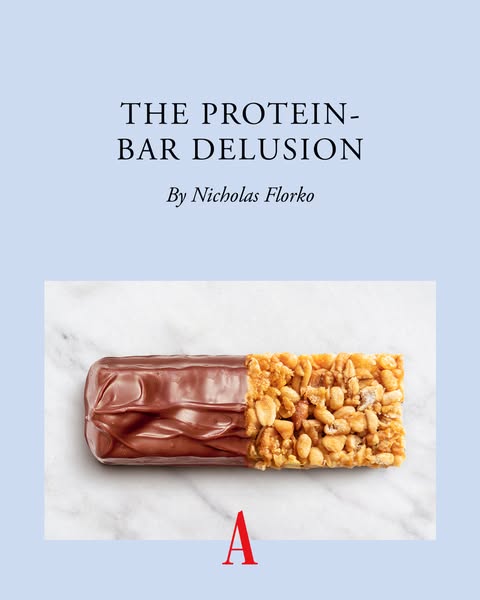 This image ad critiques the nutritional value of protein bars. The ad features a protein bar with one end dipped in choc