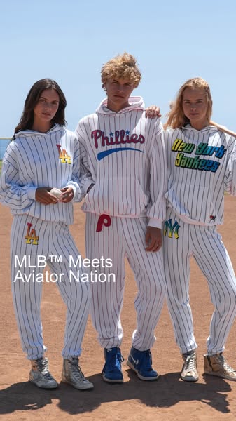 This image ad showcases three models wearing matching striped sweatsuits. Each model wears sweatsuits themed for differe