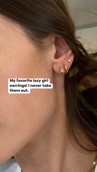 This ad features a close up of a person's ear with multiple earrings and uses the language, "My favorite lazy g