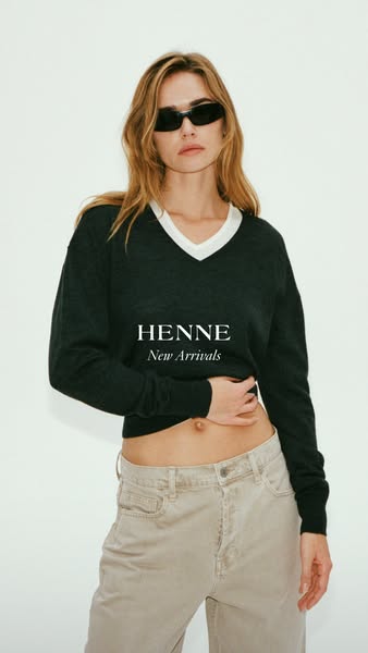 This ad promotes HENNE's new arrivals, featuring a model wearing a v-neck sweater and showcasing a clean, minimalist