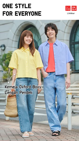 This ad showcases a boxy Oxford shirt from Uniqlo. It features a man and woman walking side-by-side wearing the product.