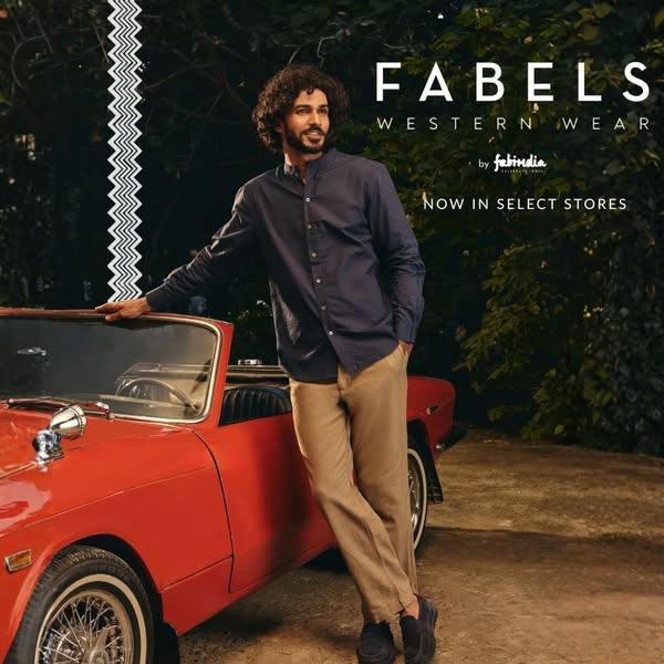 This ad features a man leaning against a red car, showcasing Fabel's Western Wear. The ad promotes the availability 