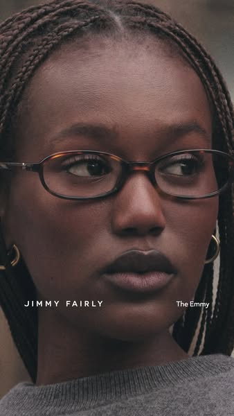 Close up product shot of Jimmy Fairly eyeglasses on a model.