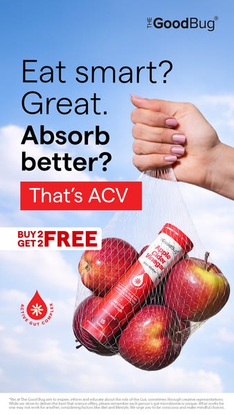 This image ad by The Good Bug promotes its Apple Cider Vinegar. The ad features a hand holding a mesh bag filled with ap