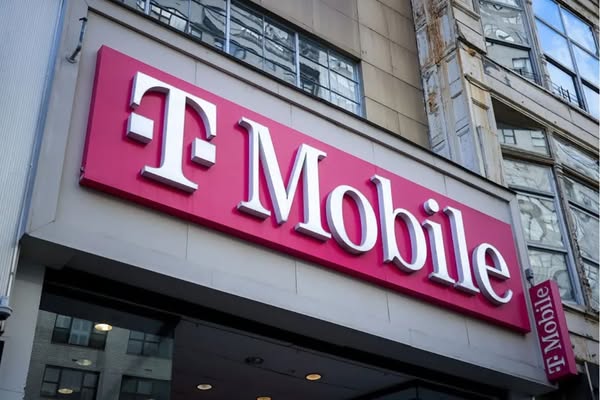 This image is of a T-Mobile store front sign on the side of a building.