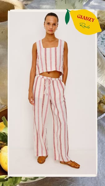 An image ad featuring a woman wearing a matching top and pants set.