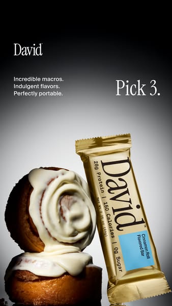Image ad for David protein bars, highlighting their cinnamon roll flavor and nutritional benefits.