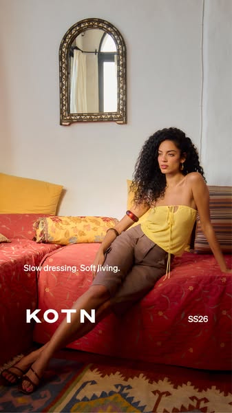 This ad for KOTN features a woman wearing the brand's clothing in a relaxed, indoor setting. The ad emphasizes the b
