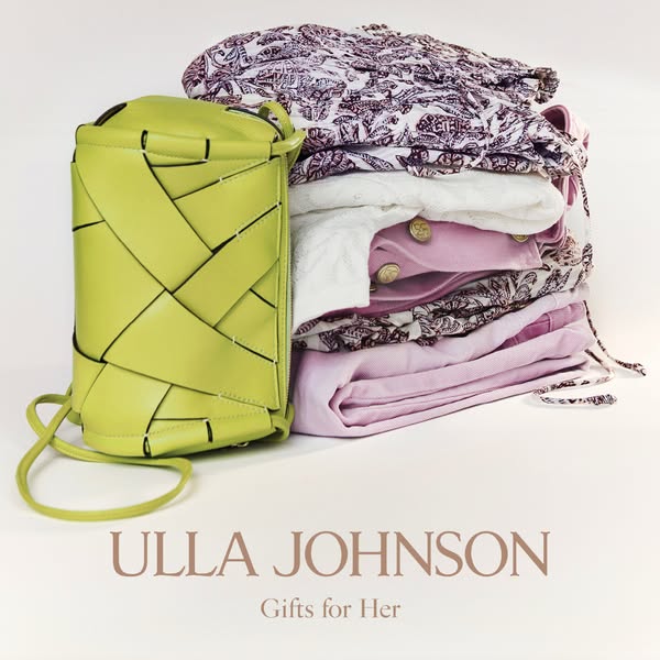 This image ad showcases a green Ulla Johnson woven leather bag next to a neatly folded pile of clothes. It conveys the b