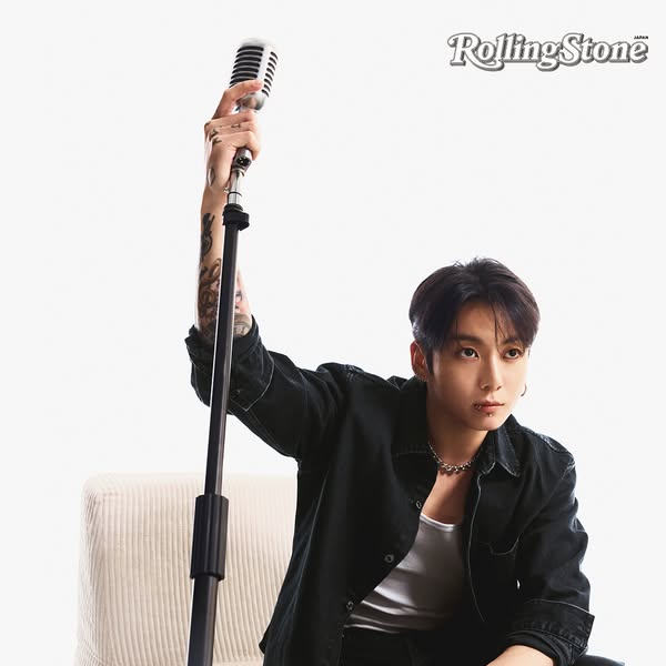 This ad features Jungkook of BTS posing with a vintage microphone for Rolling Stone Japan.