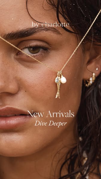 This ad features a close-up of a woman wearing a gold necklace with gemstone and pearl charms. It promotes By Charlotte&