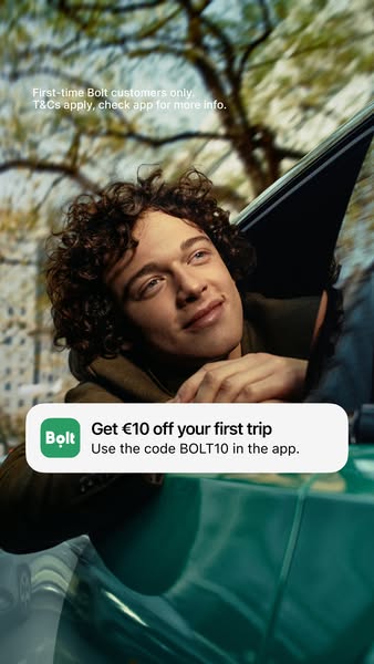 This ad for Bolt features a young man looking out the window of a car. The ad promotes a discount of €10 off the first t