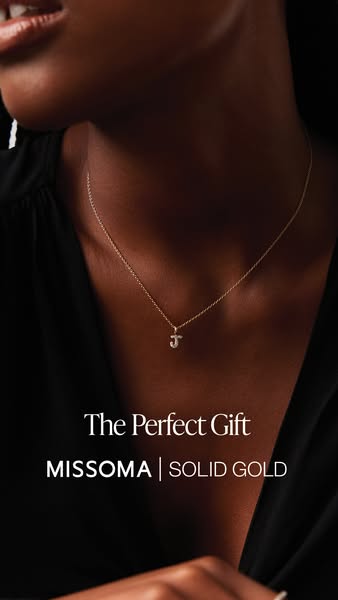 This ad showcases a gold initial pendant necklace from Missoma as the perfect gift.