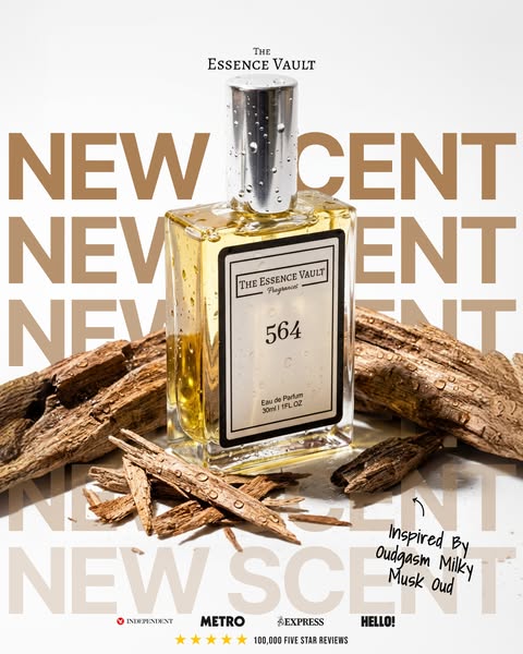 This ad showcases a bottle of "564" fragrance from The Essence Vault brand. The backdrop features fragmented p