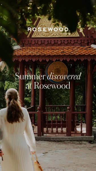 This image ad for Rosewood Hotels invites the viewer to discover summer at their locations. The ad features a woman walk